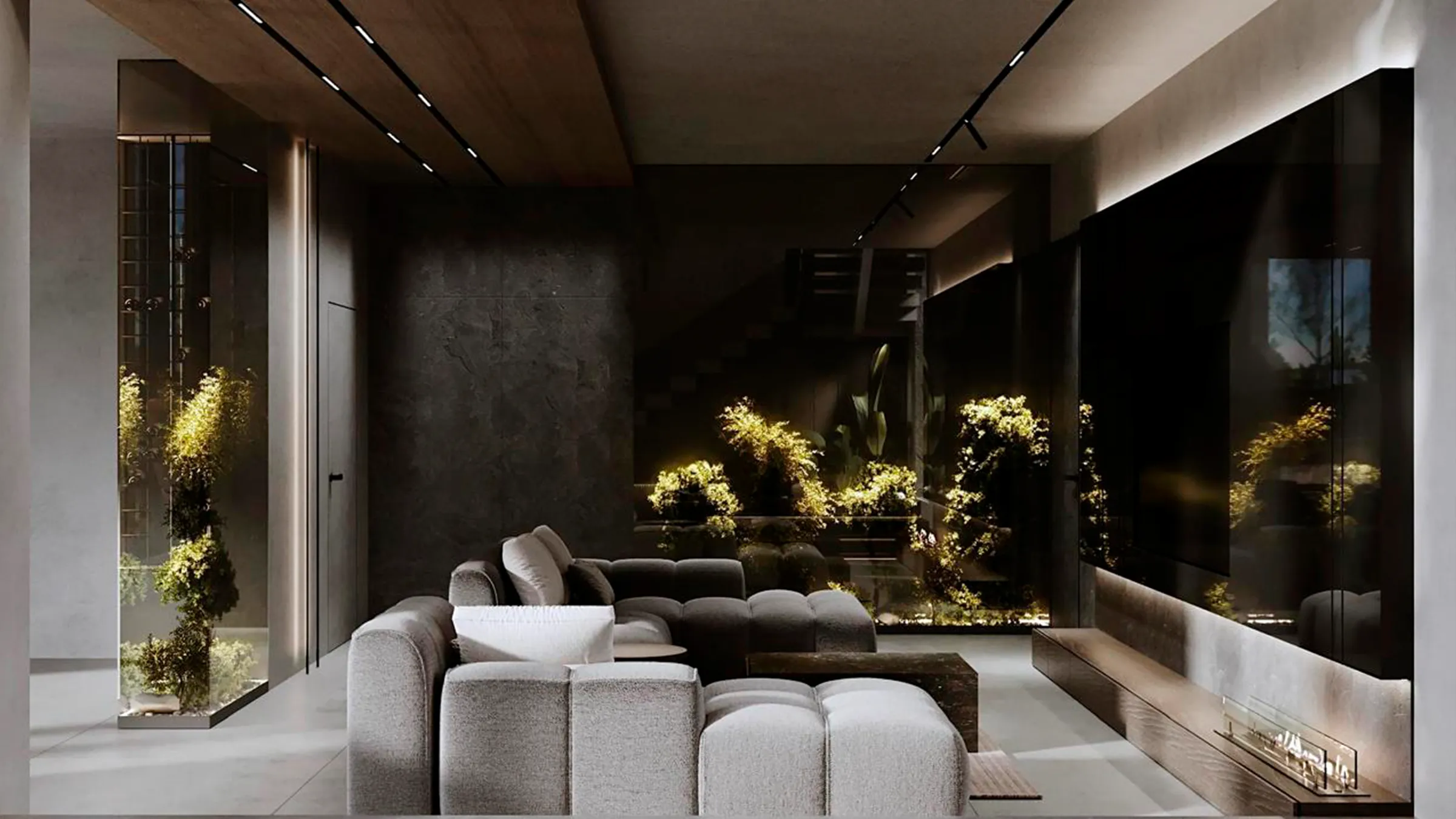 View of the rear and side of a Porsche 911 Turbo S in Oak Green Metallic Neo, standing in a courtyard.